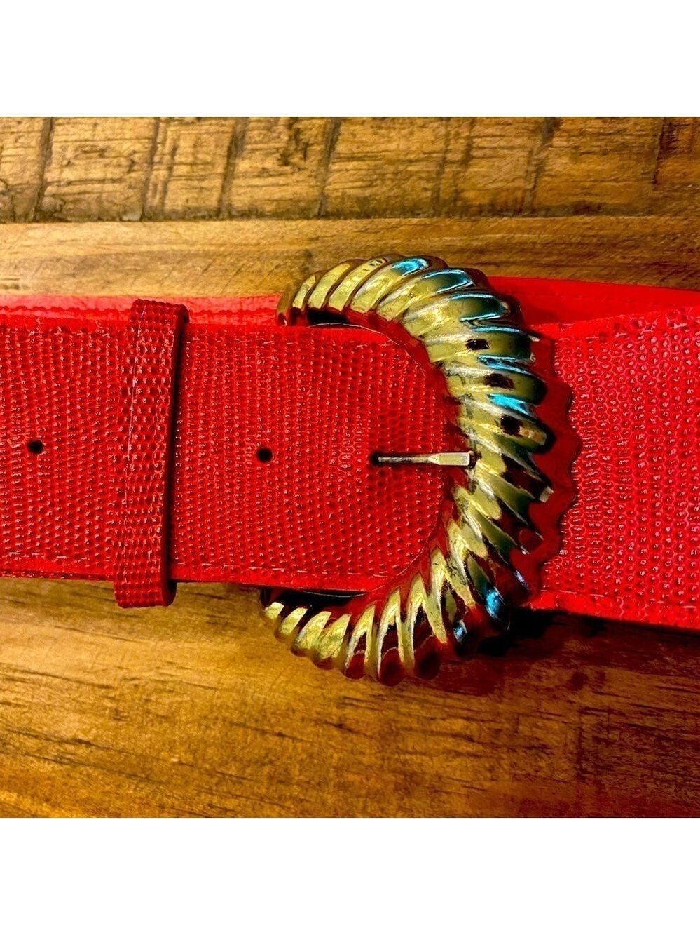 Red faux leather belt with gold tone buckle.  Make a bundle.  35.5” long
